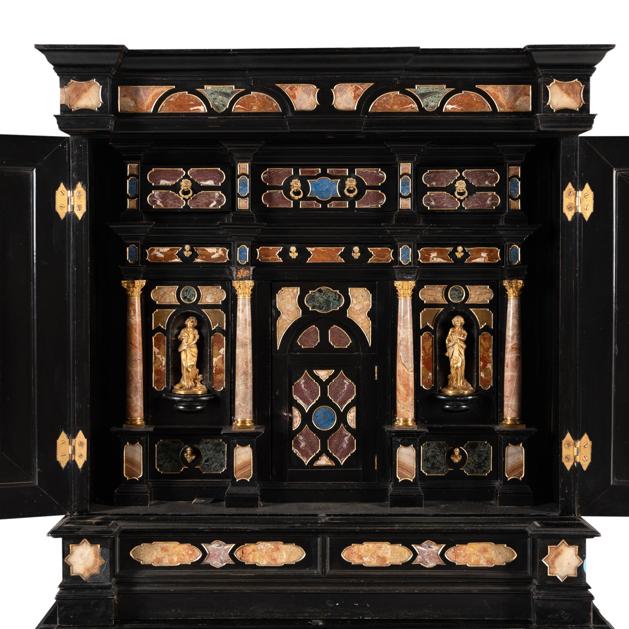An Italian Baroque Style Ebonized, Specimen Marble-Inset and Parcel Gilt Collector's Cabinet