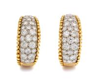 A Pair of 18 Karat Bicolor Gold and Diamond Earclips, 10.10 dwts.