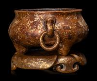 A Chinese Gold-Splashed Bronze Incense Burner and Stand
