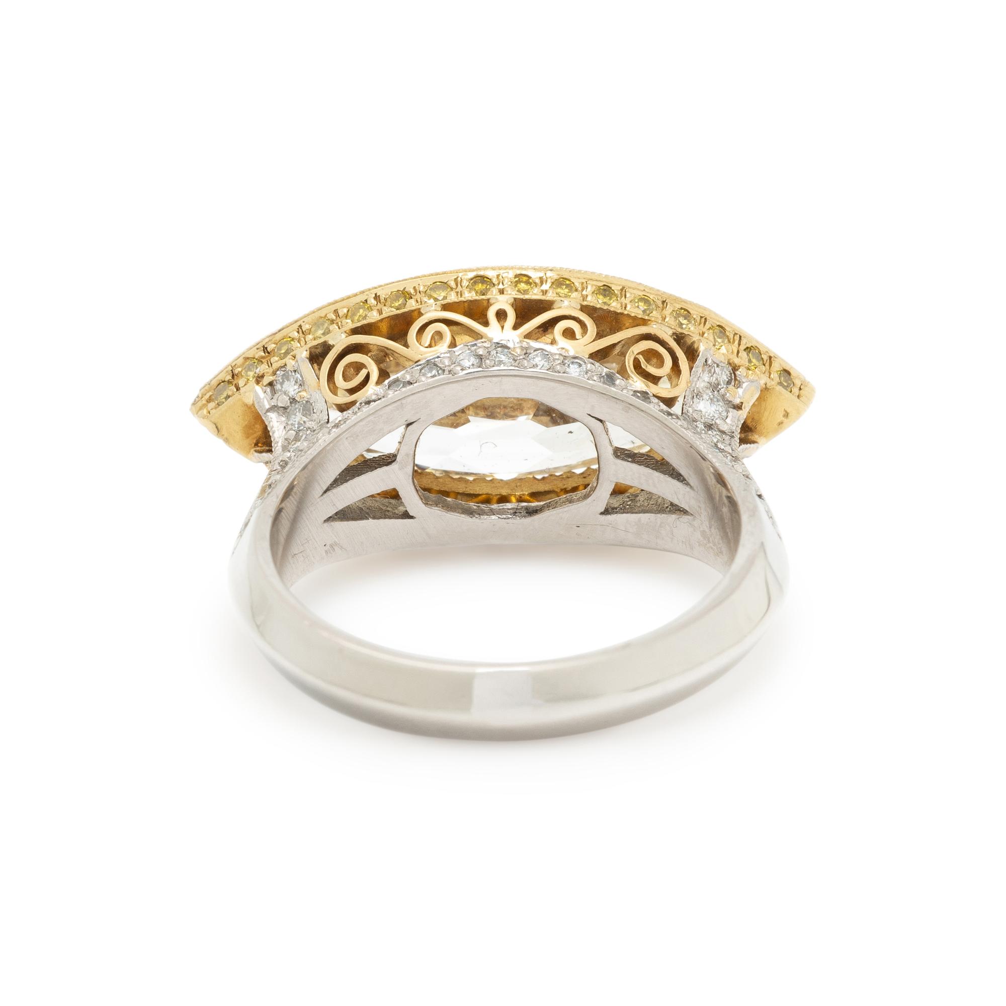 EAST-WEST MARQUISE CUT DIAMOND AND YELLOW DIAMOND RING