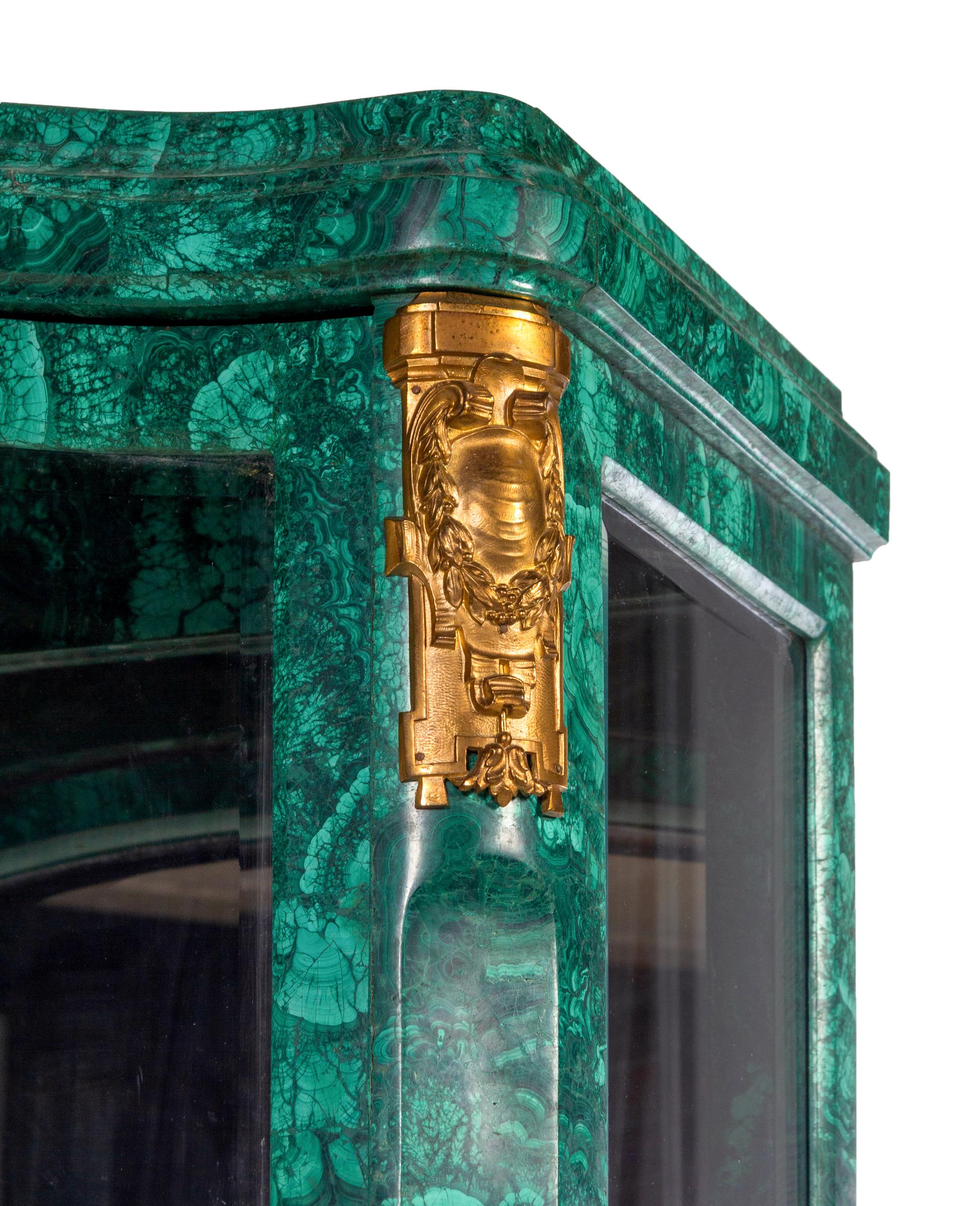 A Louis XV Style Gilt Metal Mounted Malachite Veneered Vitrine Cabinet