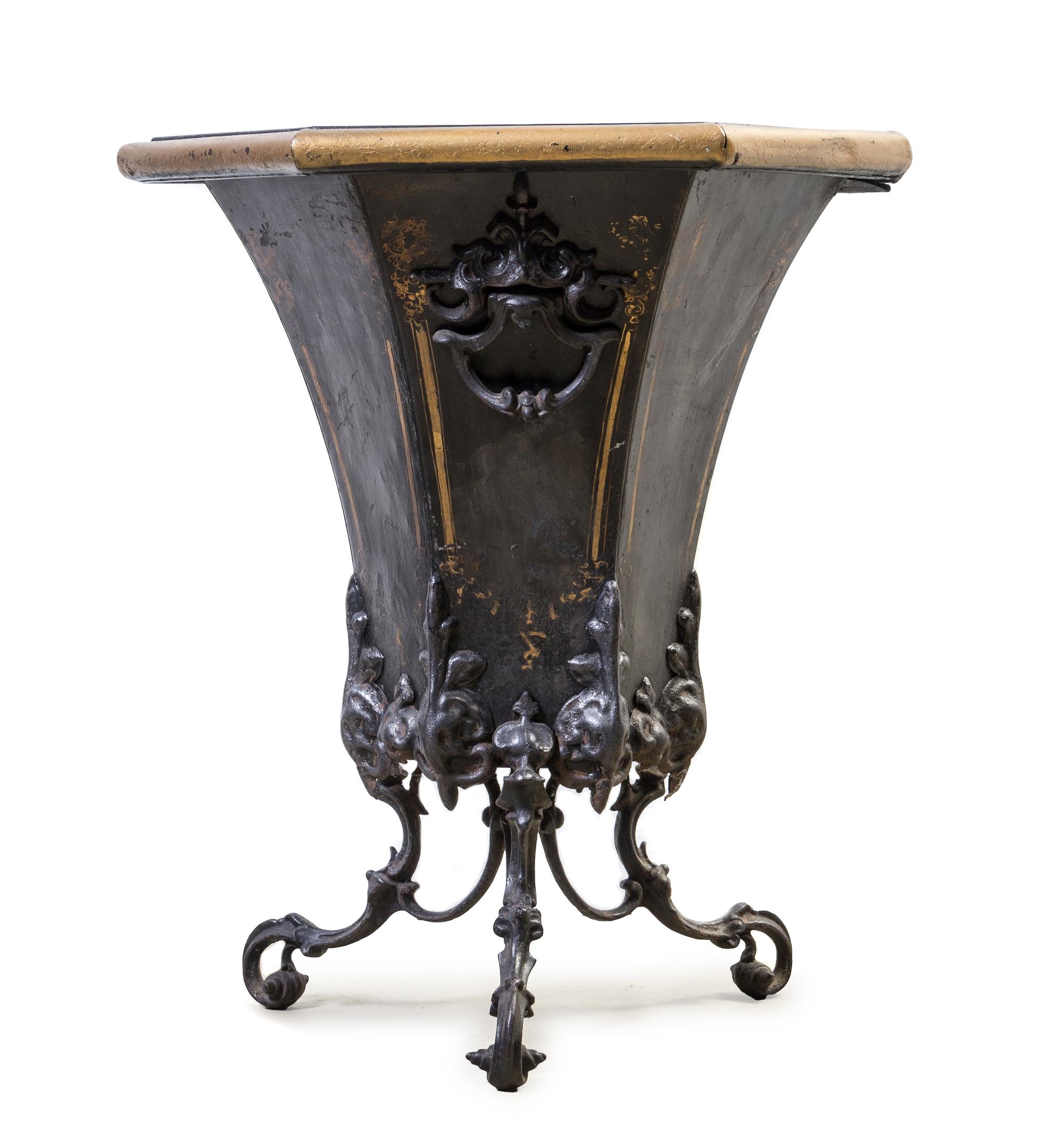 A Victorian Tole Coal Scuttle, Height 23 x diameter 17 3/4 inches.