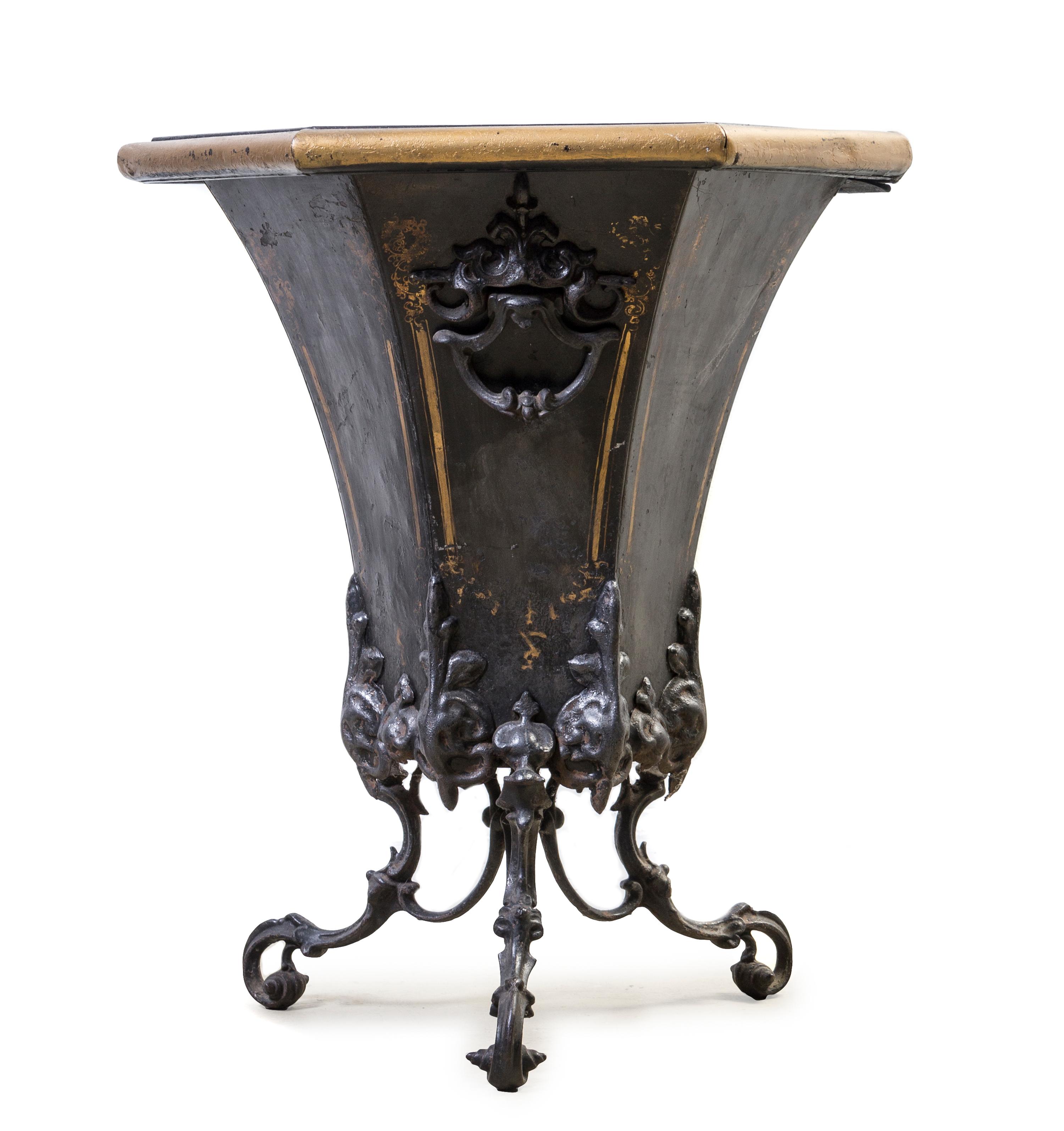 A Victorian Tole Coal Scuttle, Height 23 x diameter 17 3/4 inches.