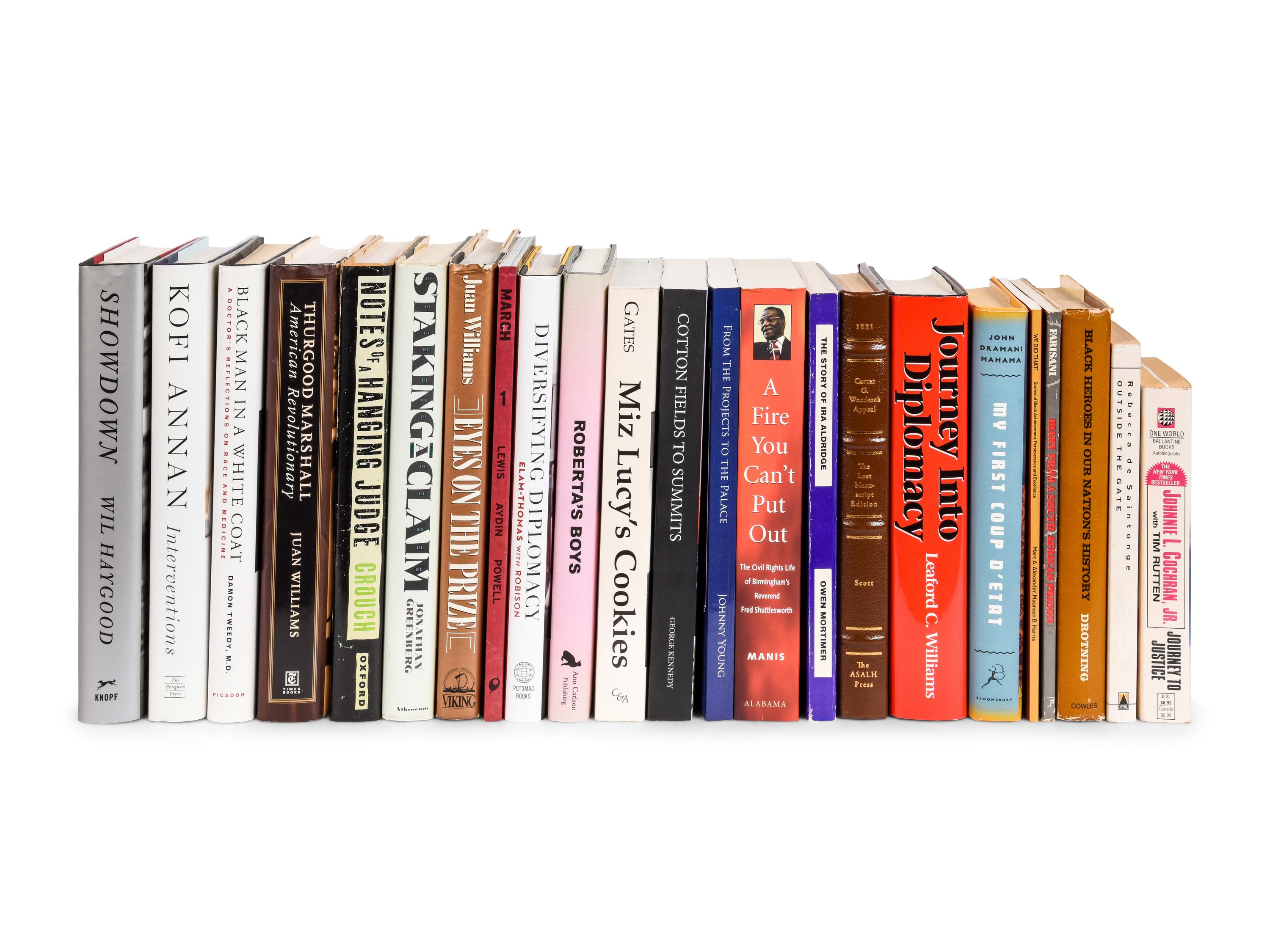 [PERKINS, Edward Joseph (1928-2020)]. A group of 23 volumes related to African and African American Biography and History, most signed or inscribed to Perkins, including: