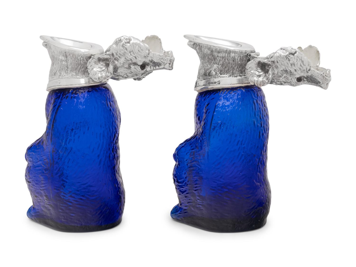A Pair of Silver-Plate and Colored Glass Bear Decanters