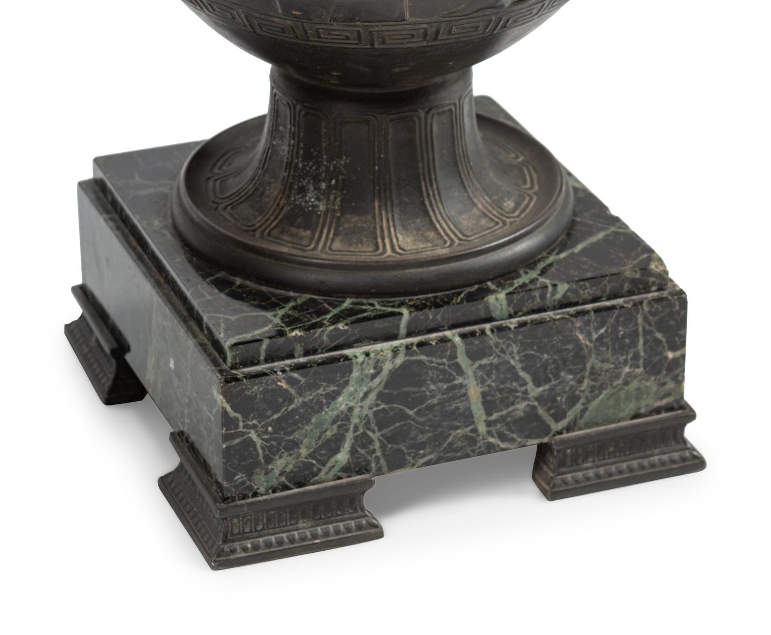A Pair of Grand Tour Patinated Metal Urns on Marble Bases