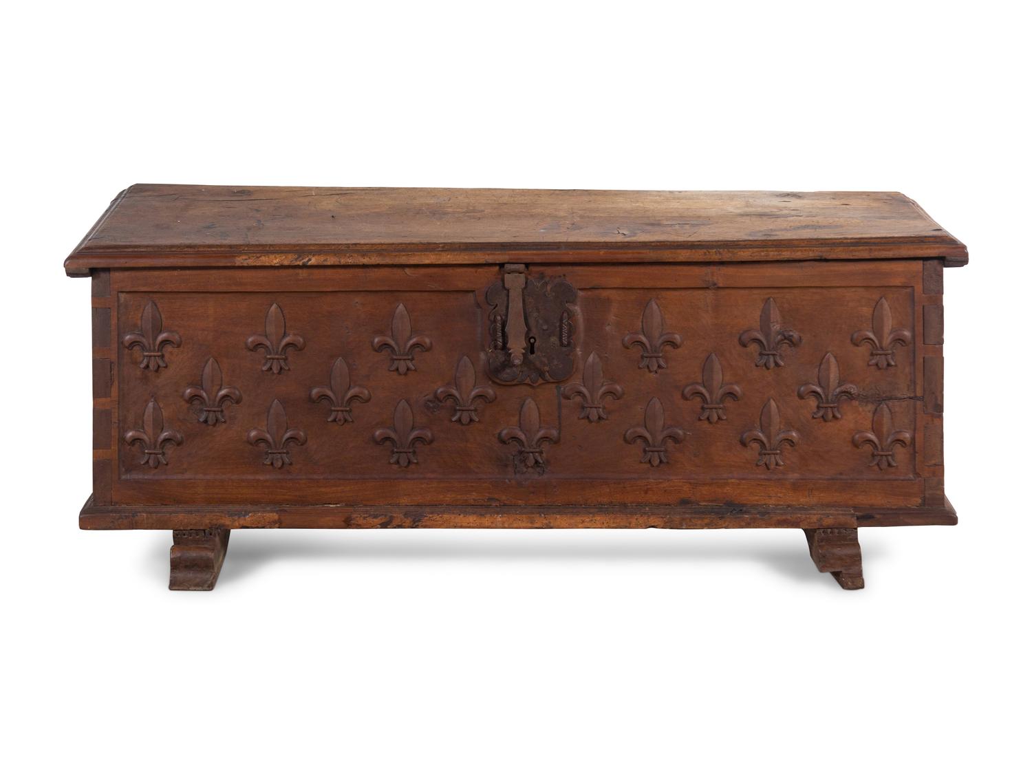 A Continental Carved Walnut Cassone