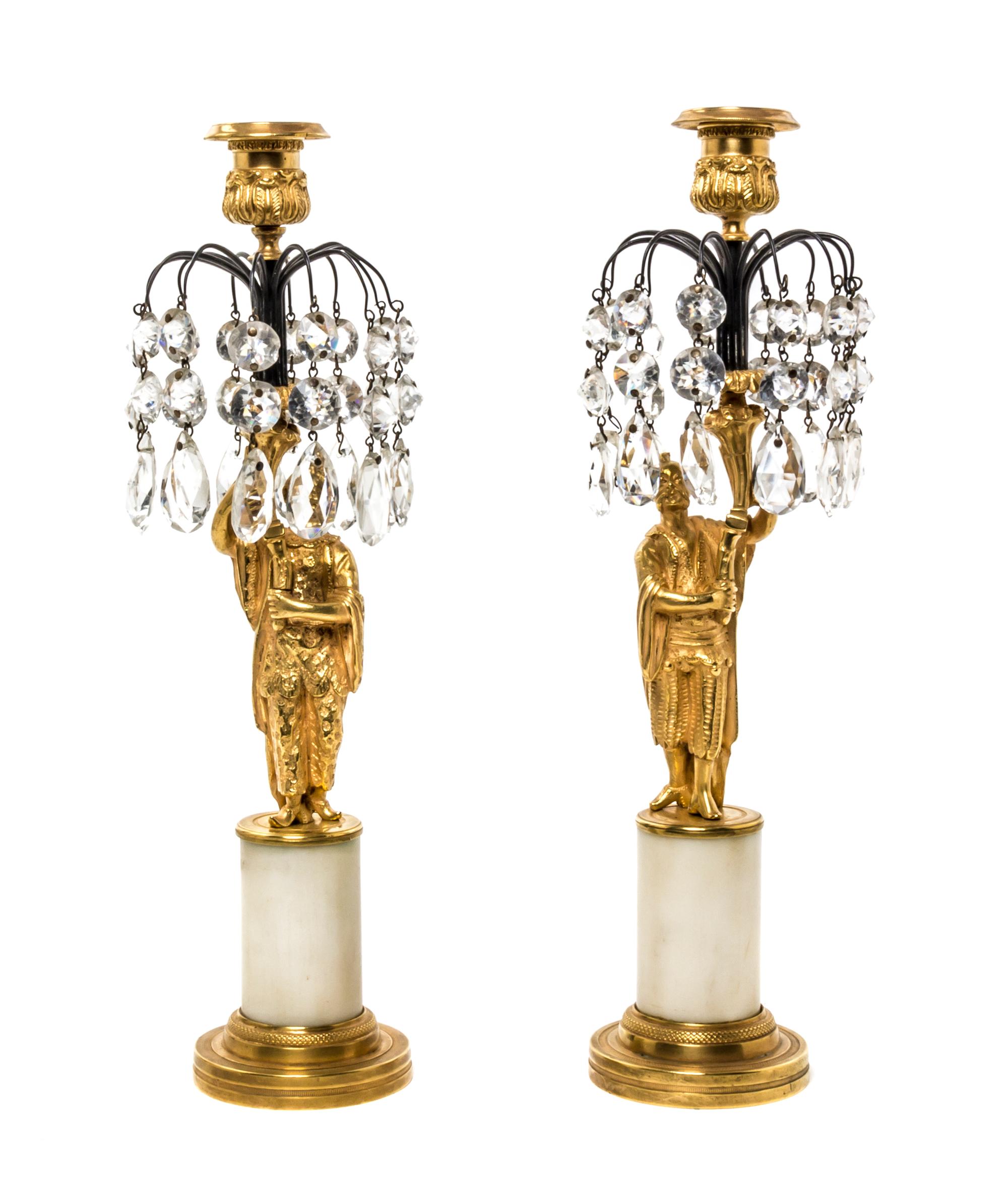 A Pair of Continental Gilt Bronze Figural Candlesticks, likely Swedish, Height 13 1/2 inches.