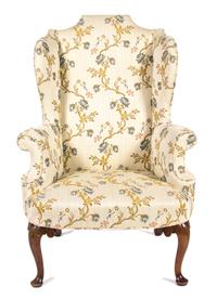 A Queen Anne Style Mahogany Wing Chair Height 47 inches. — 20TH CENTURY