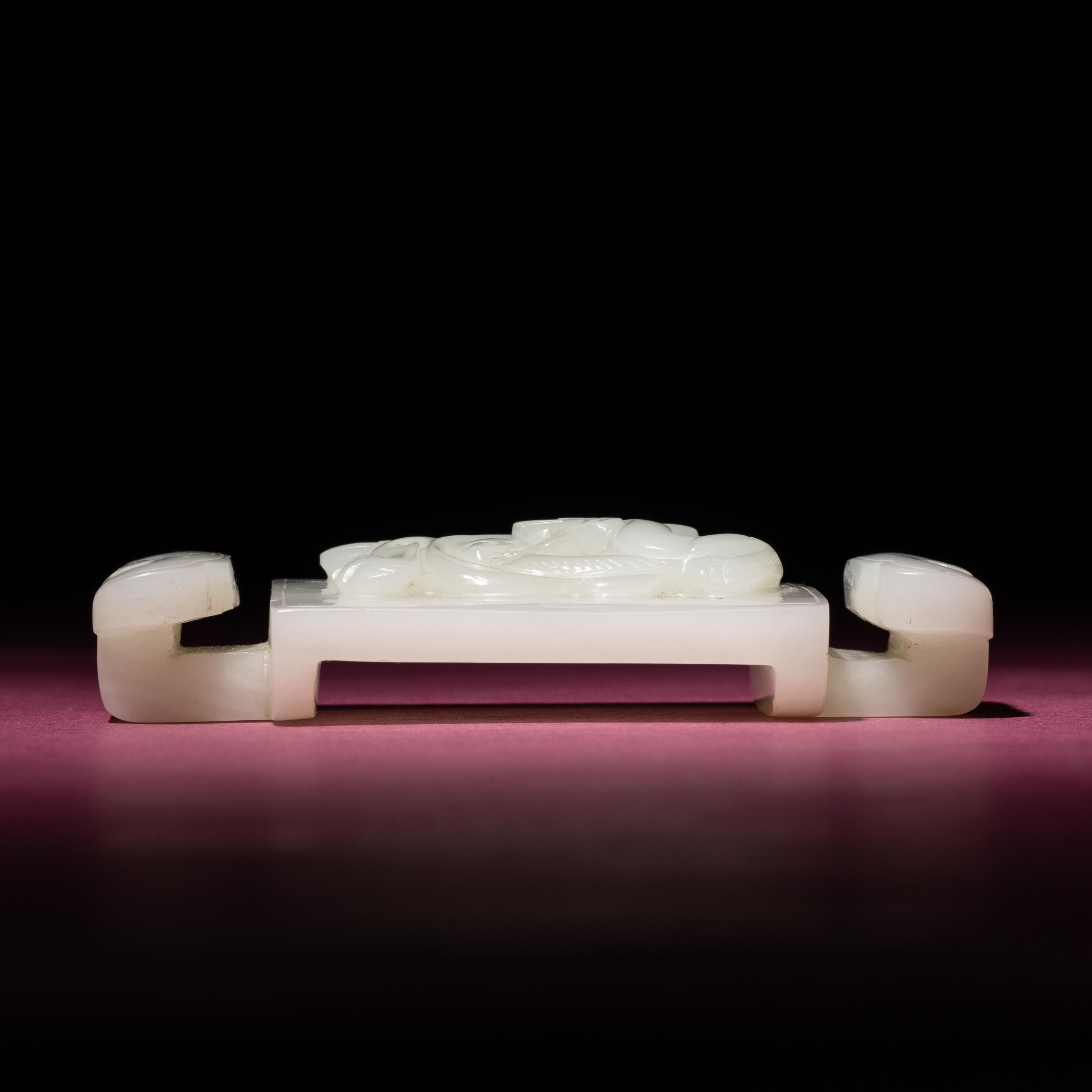 A Chinese Carved White Jade 'Dragon' Belt Hook, 18th Century — 清中期 白玉螭龍紋帶扣