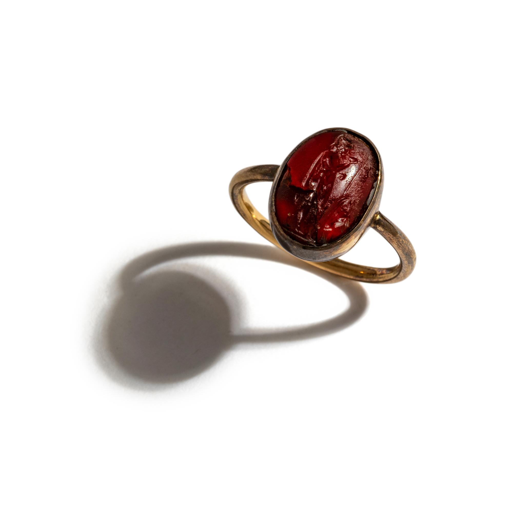 A Neoclassical Gold and Garnet Finger Ring with the God Mars