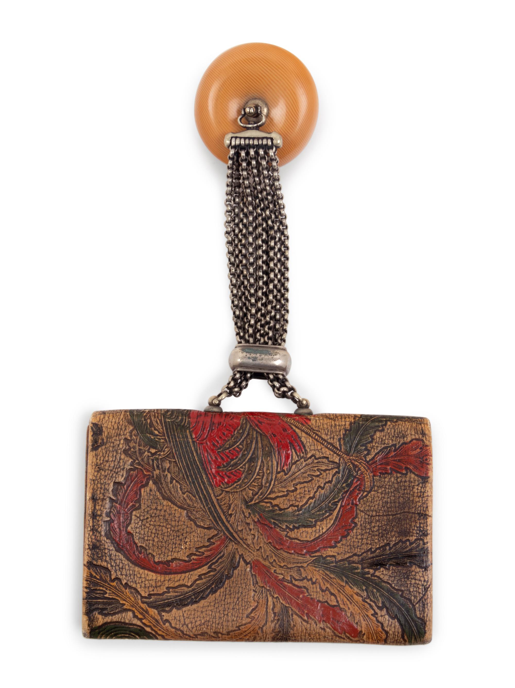 A Leather Purse and A Fabric Fan