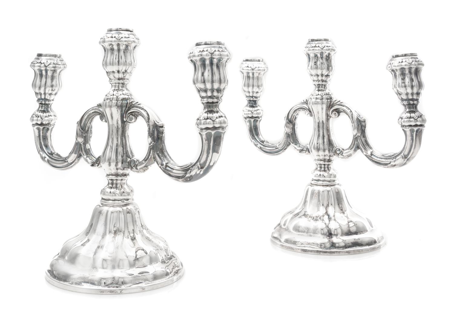 A Pair of German Silver Three-Light Candelabra, Gebruder Deyhle, Schwabisch Gmund, 20th Century, each stem issuing two scrolling candle