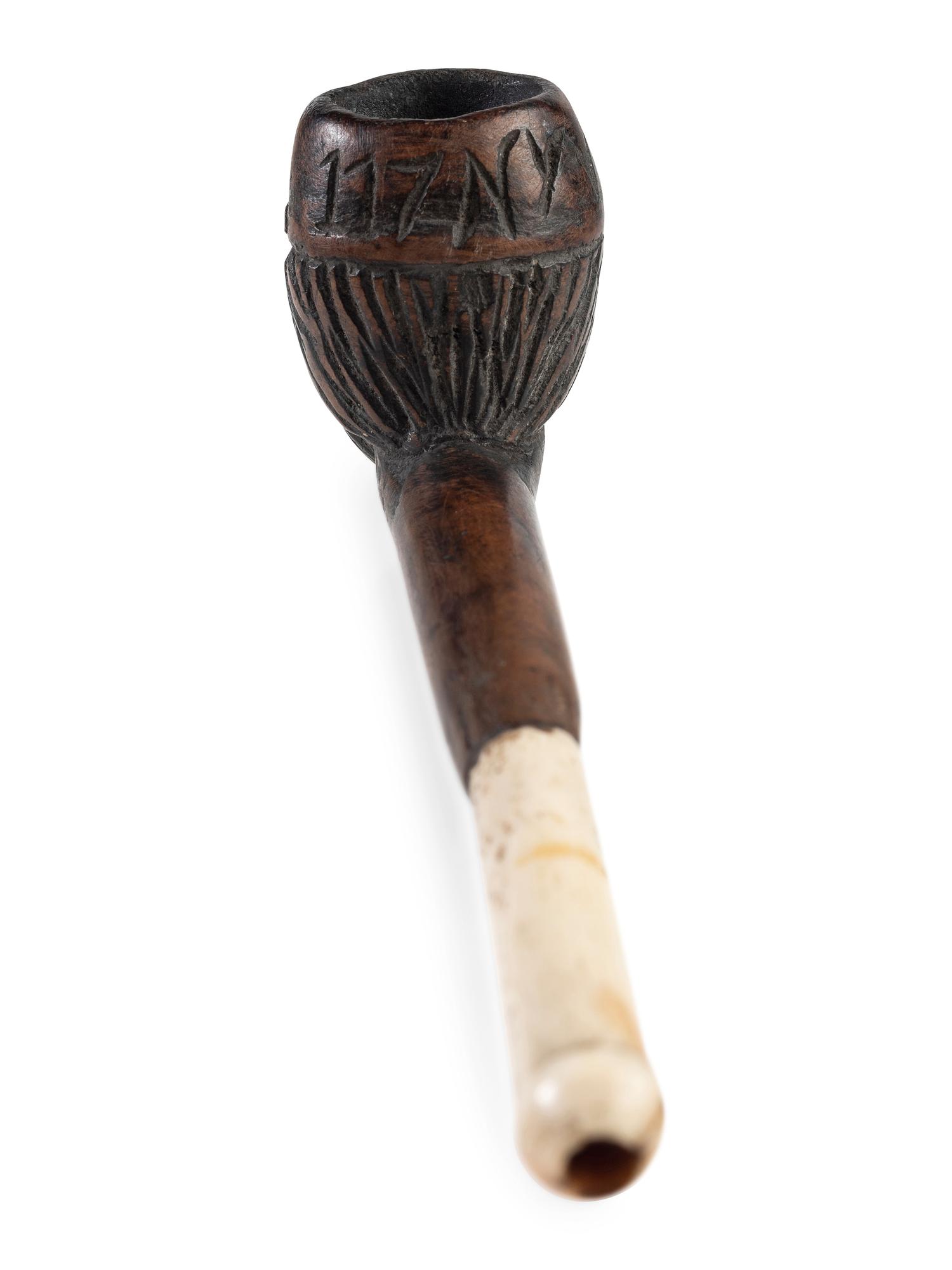 Civil War soldier folk art carved pipe identified to the 117th New York Volunteers.