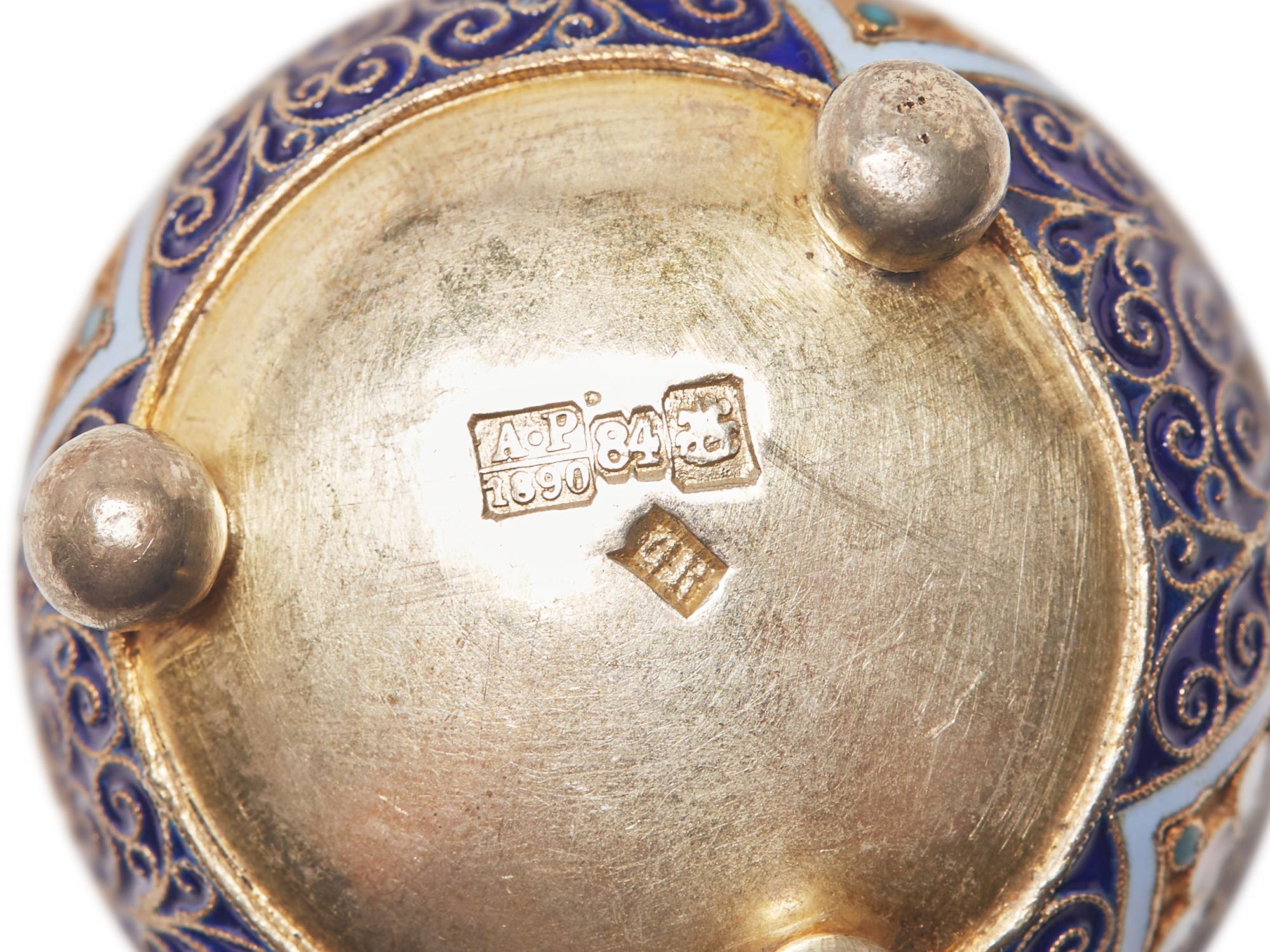 An Assembled Set of Seven Silver and Enameled Salt Cellars with Spoons