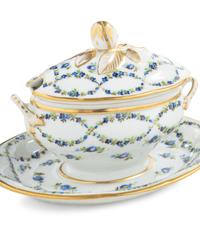 A Pair of English Porcelain Covered Sauce Tureens with Attached Underplates