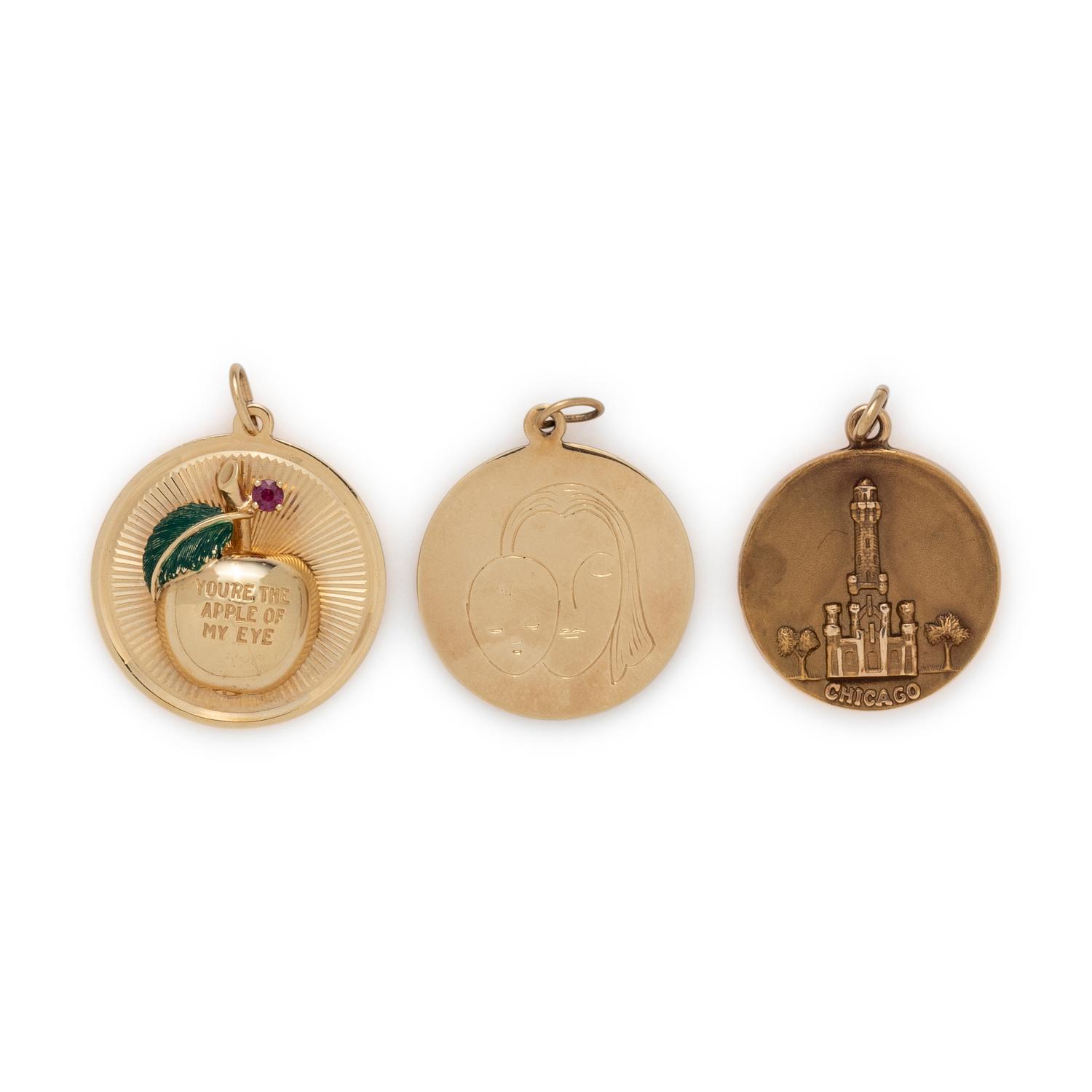 COLLECTION OF YELLOW GOLD CHARMS