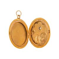 YELLOW GOLD AND DIAMOND LOCKET