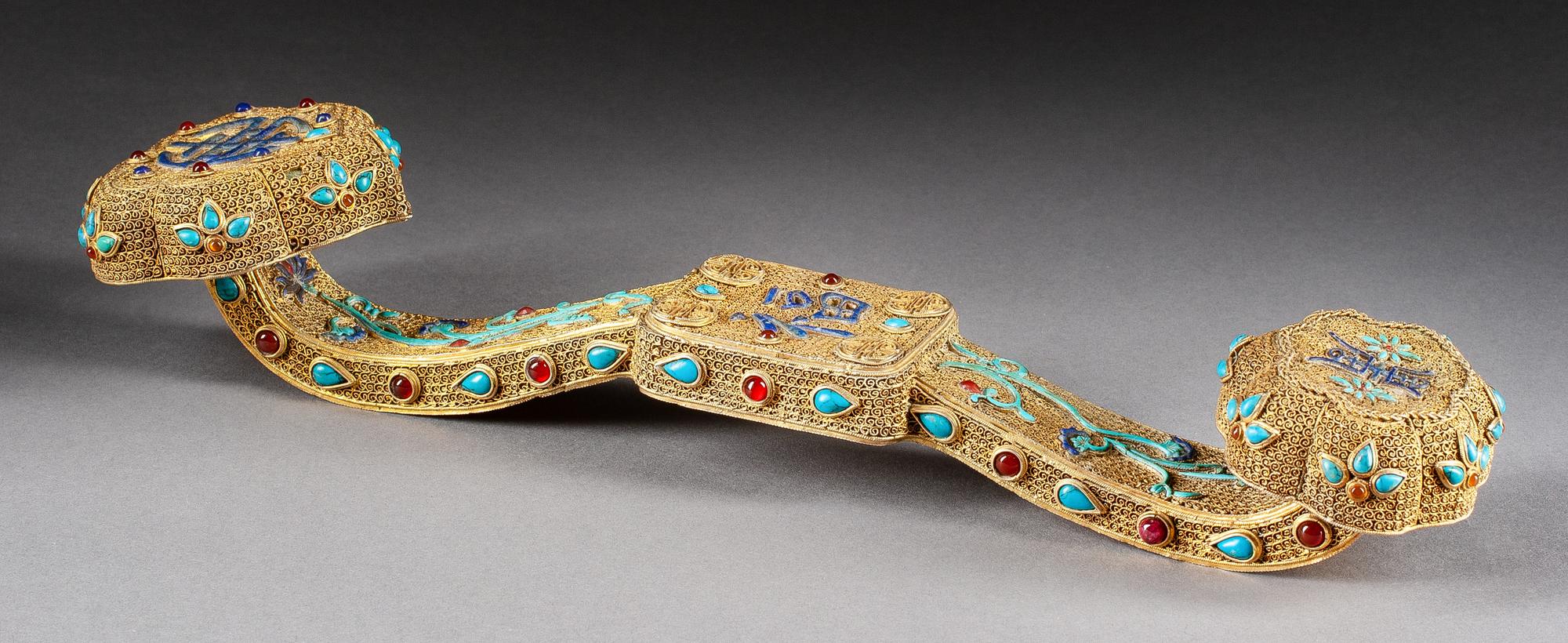 A Chinese Silver and Enameled Scepter Height 2 1/2 x width 14 inches.