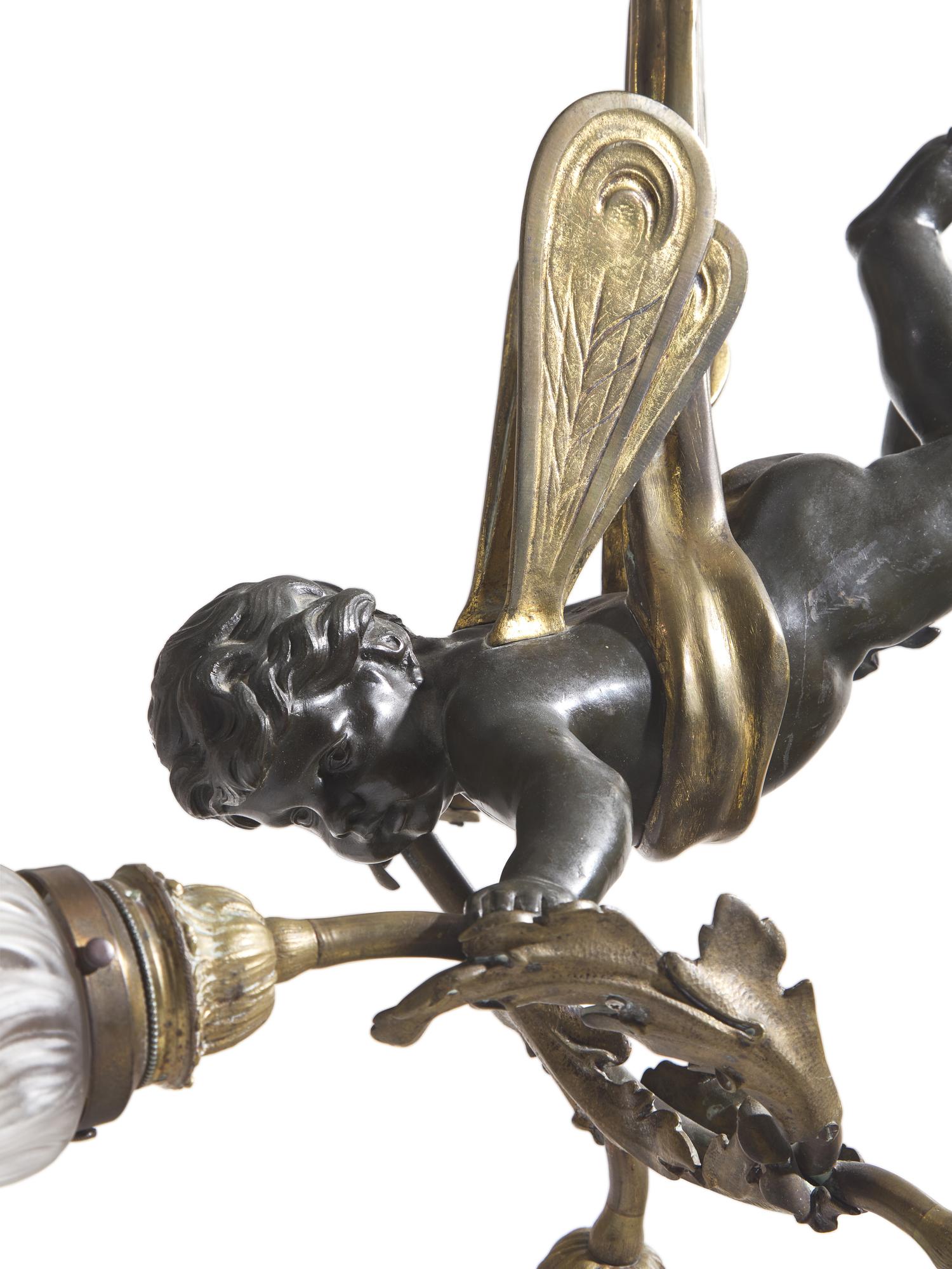 A Belle Epoch Gilt and Patinated Bronze Three-Light Pendant Lamp