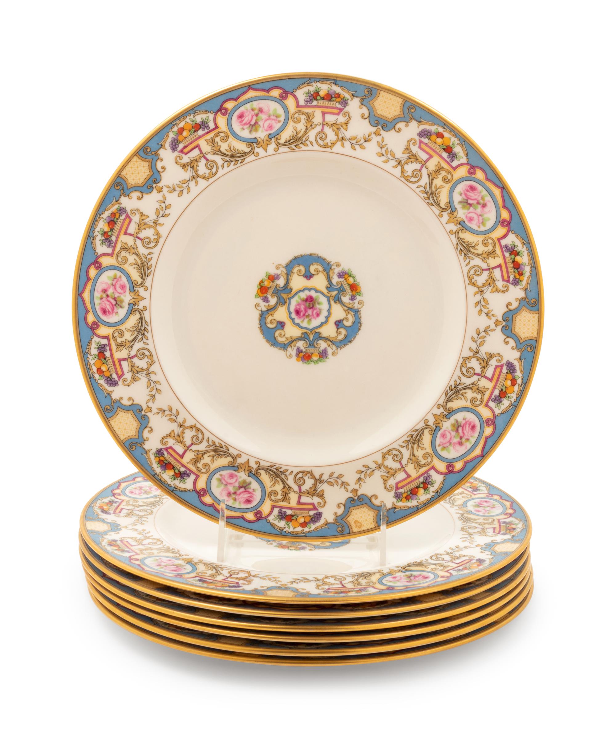 A Set of Seven Morgan Belleek Plates