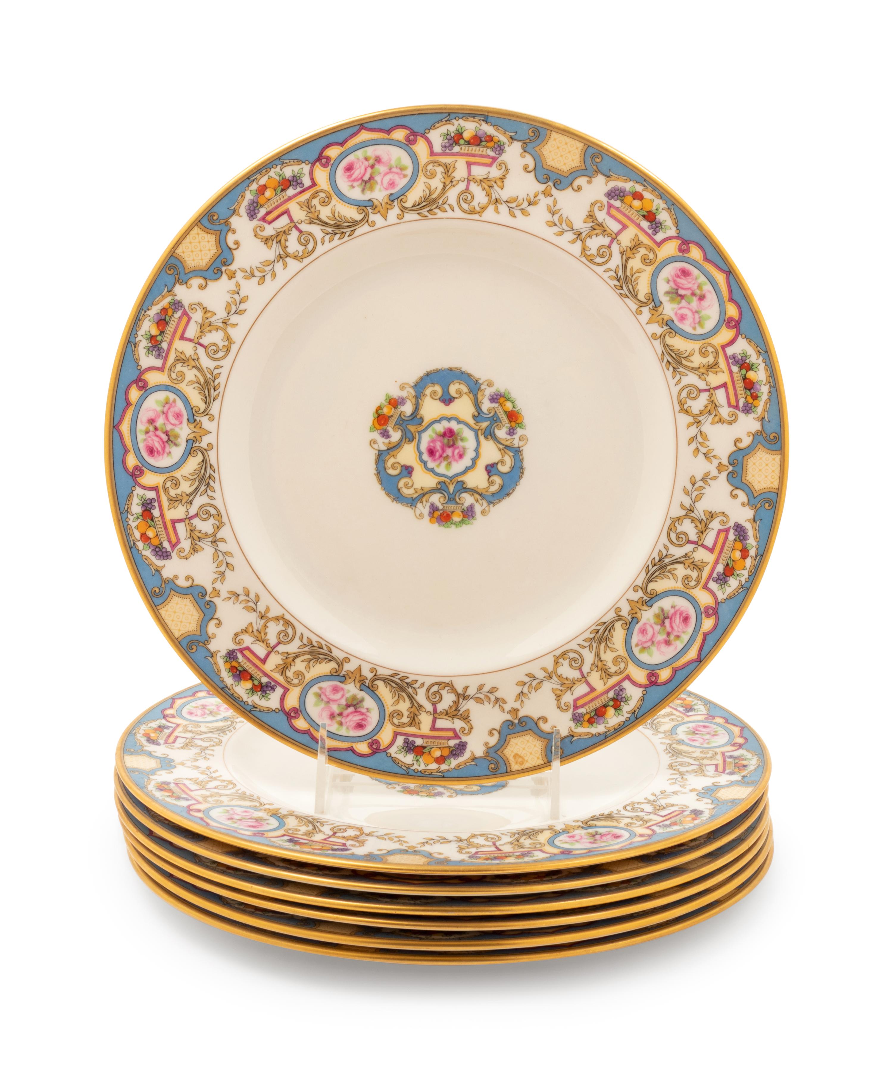 A Set of Seven Morgan Belleek Plates