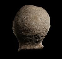 An Etruscan Over-Lifesized Nenfro Portrait Head of a Man