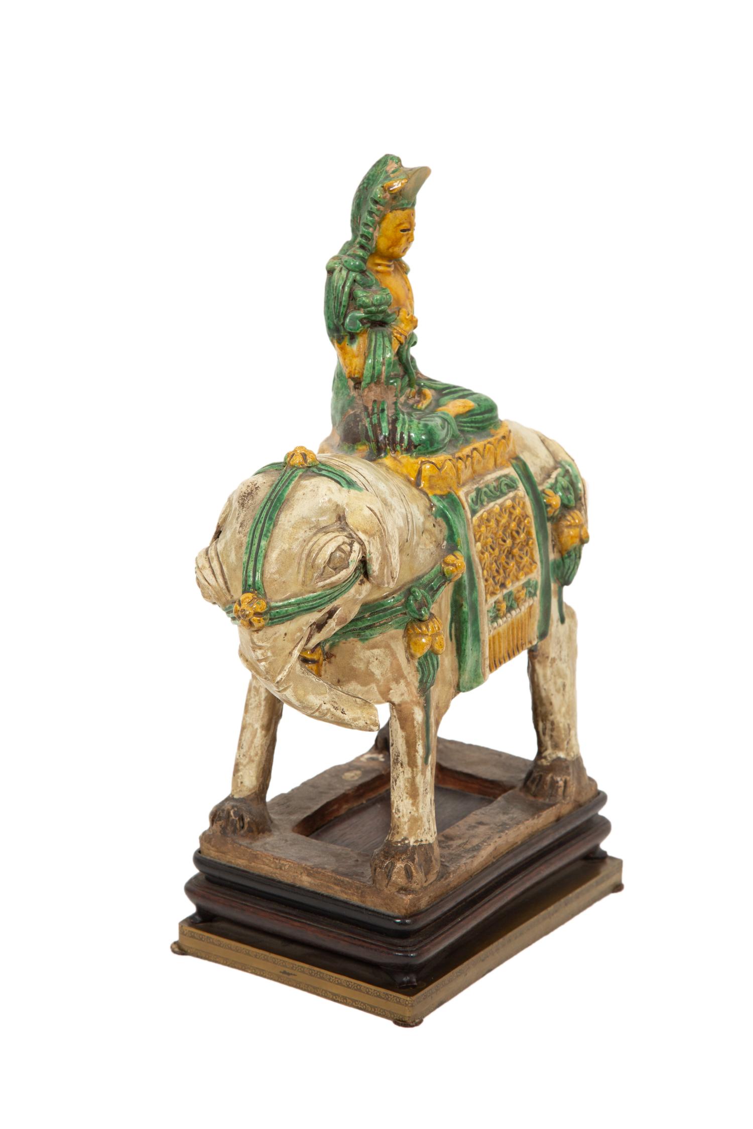 A Chinese Sancai Glazed Ceramic Elephant with a Seated Figure