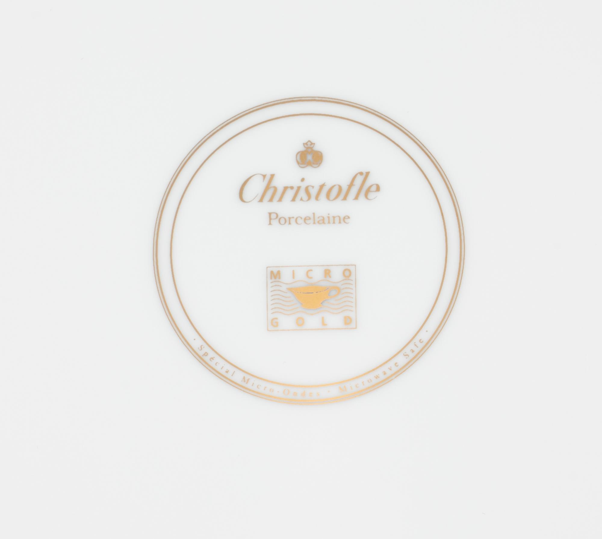 A Set of Sixteen Christofle Porcelain Chargers
