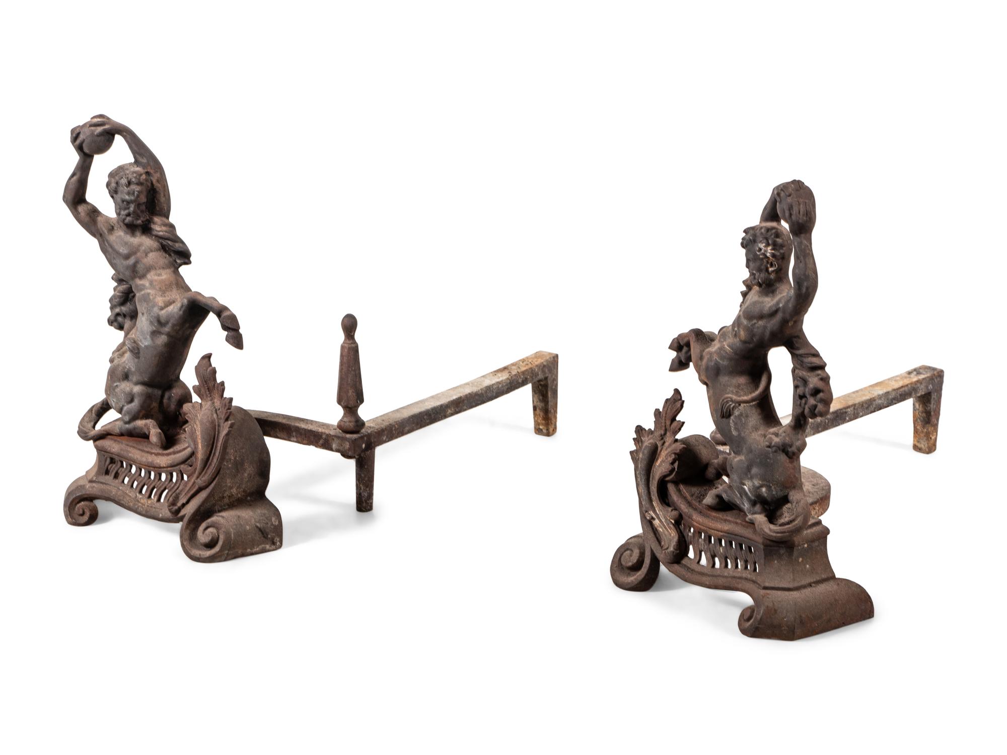 A Pair of Continental Iron Andirons with Hercules and the Nemean Lion