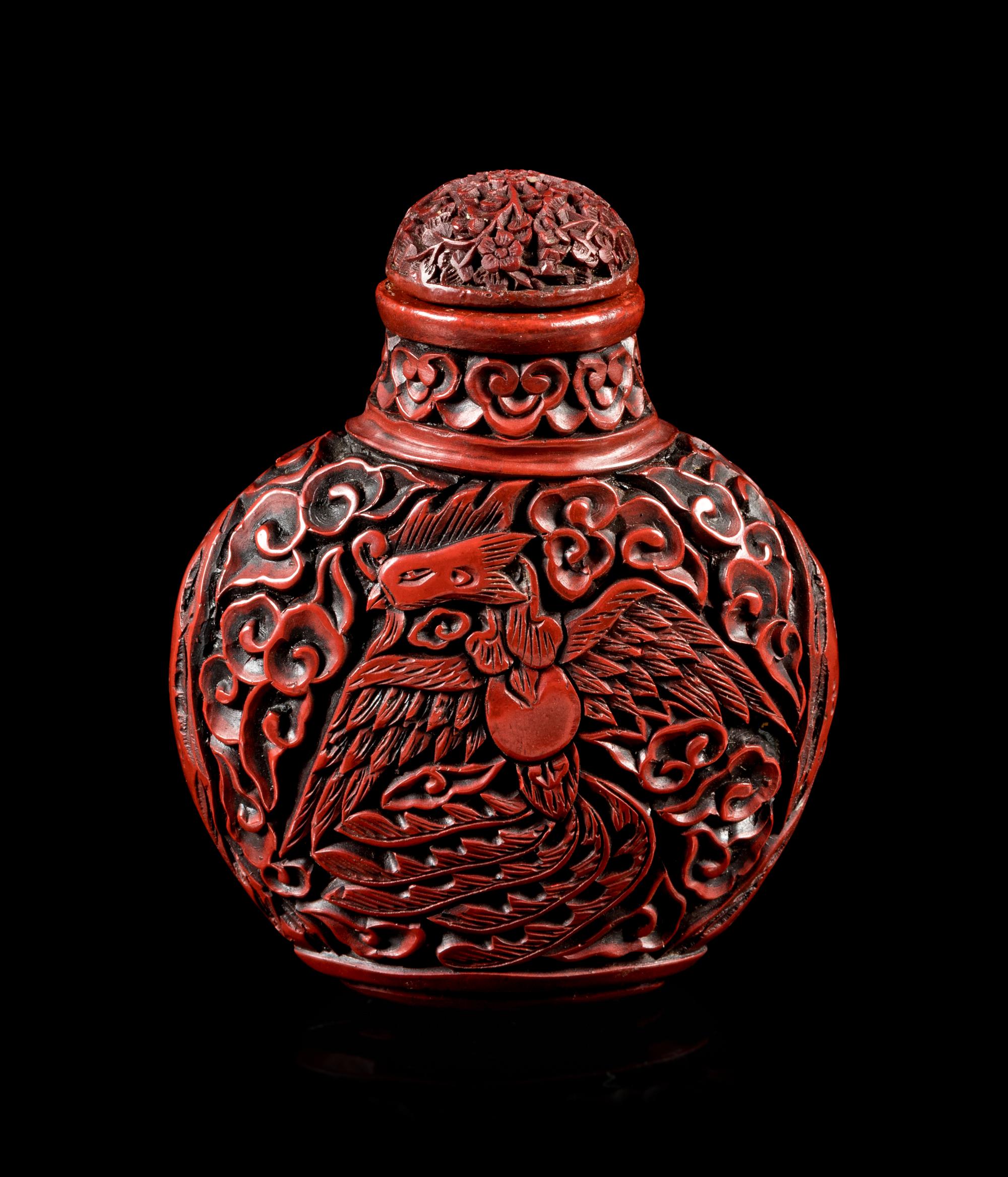 A Carved Red Lacquer Snuff Bottle