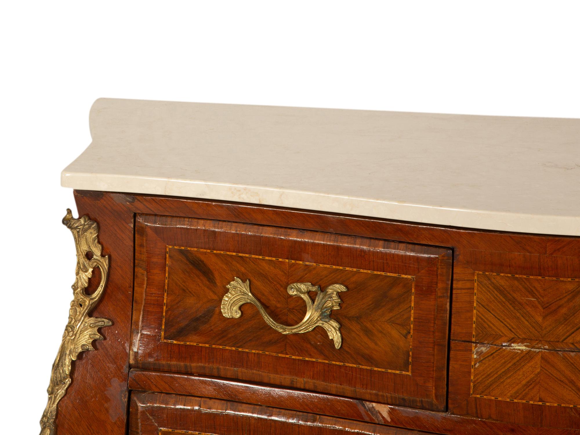 A Louis XV Style Gilt Metal Mounted Parquetry Kingwood Marble-Top Commode