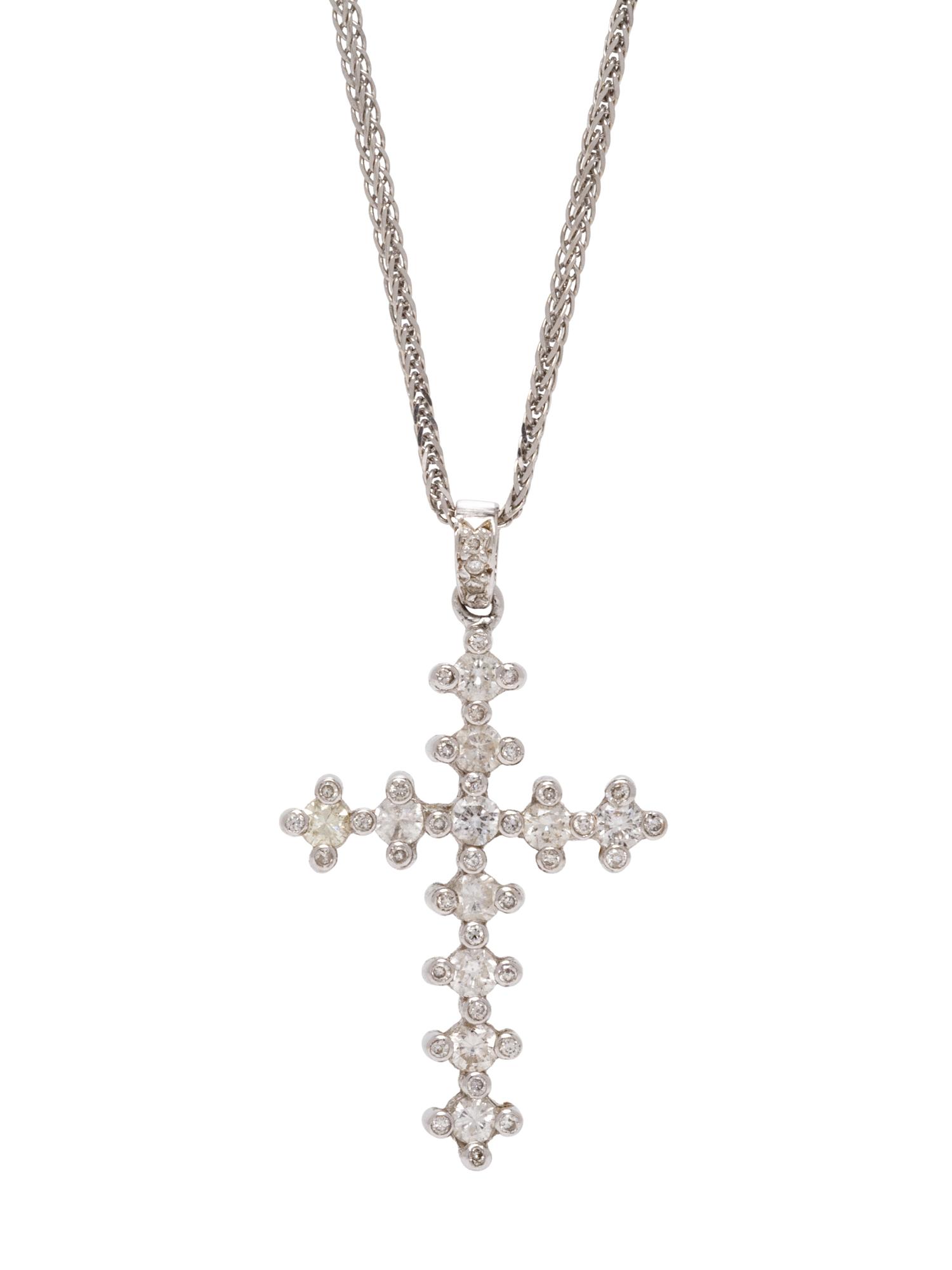 A 14 Karat White Gold and Diamond Cross Pendant/Necklace,