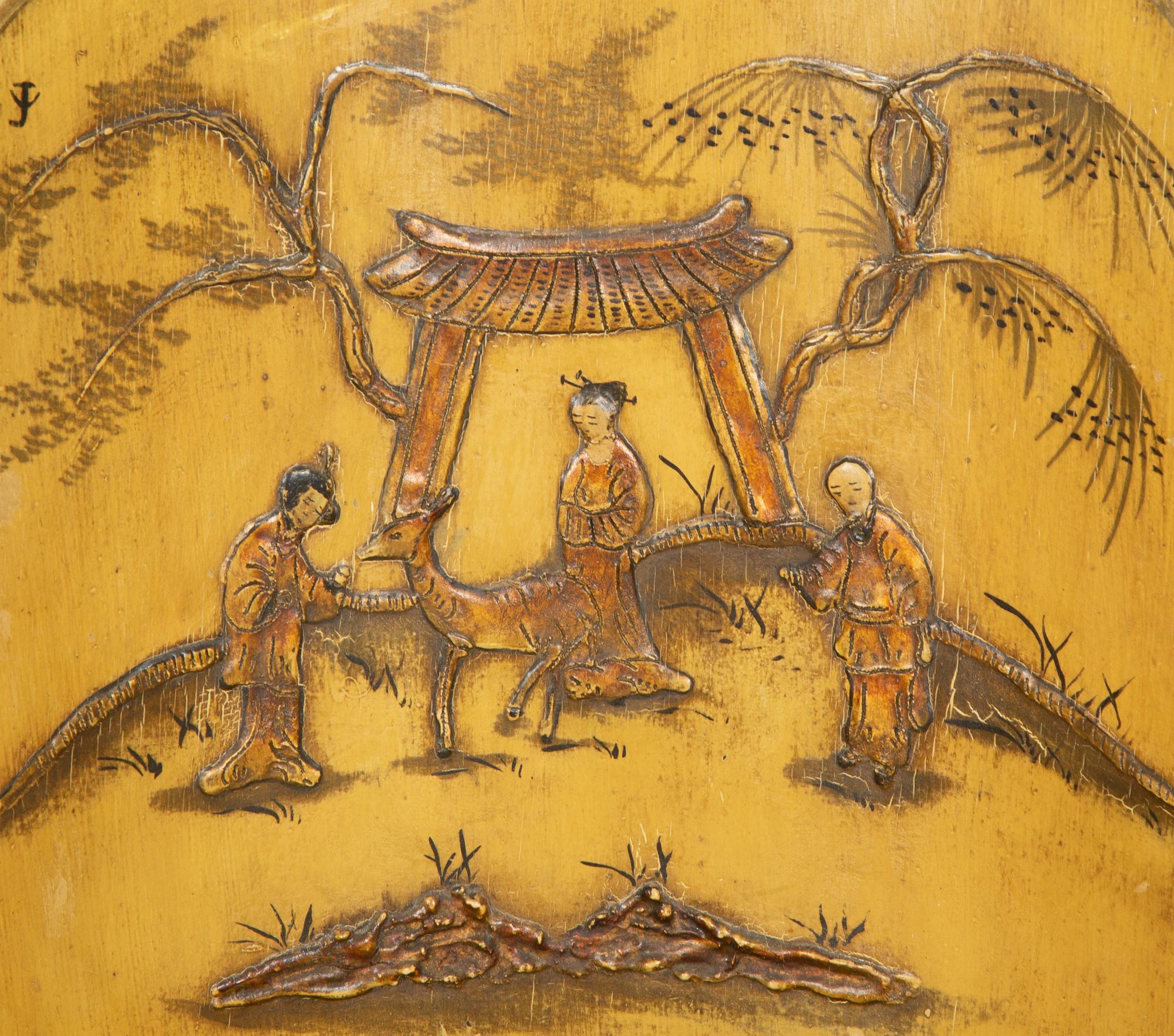 A Pair of Continental Yellow-Painted and Japanned Side Chairs