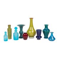 A Collection of Colored Glass and Ceramic Vases and Bottles