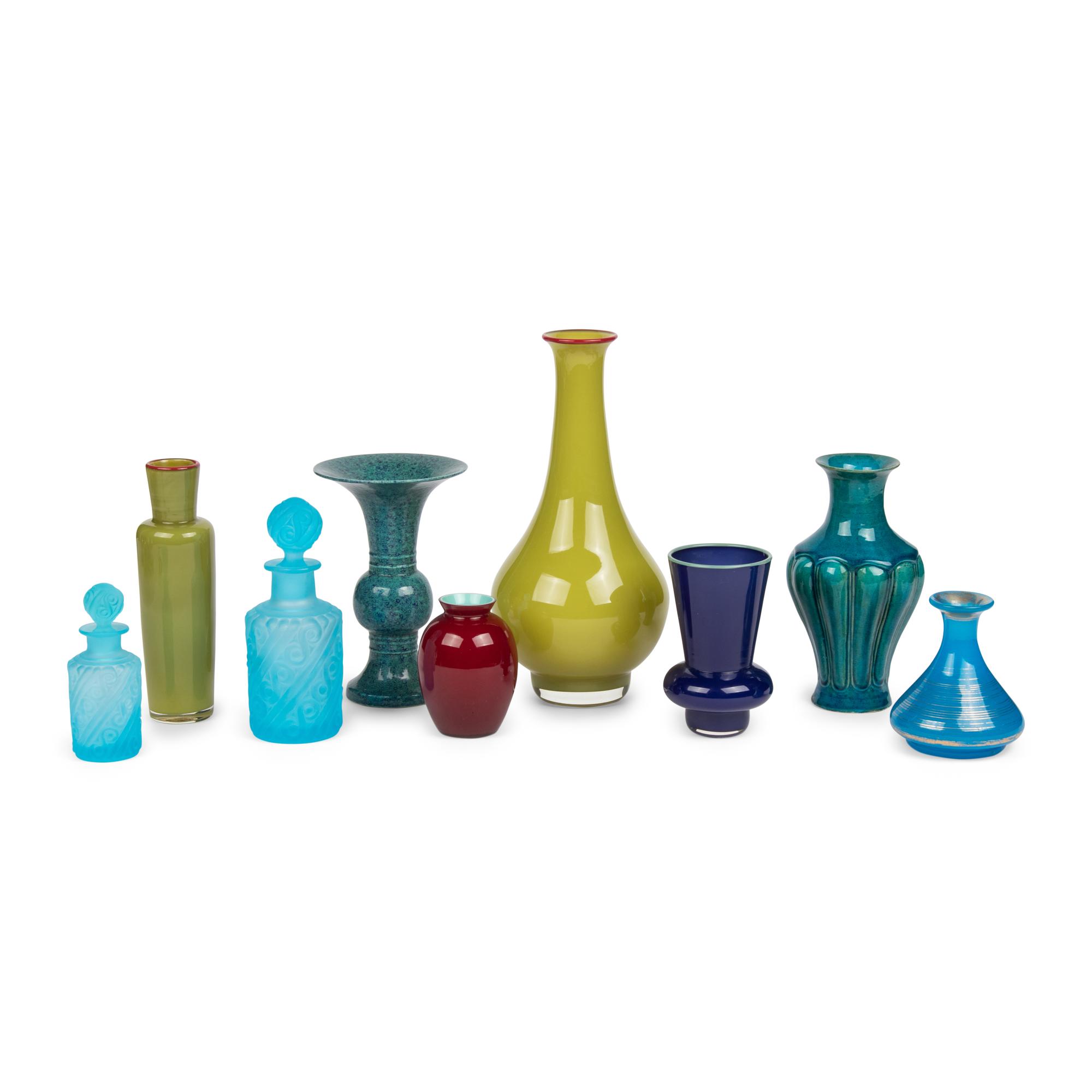 A Collection of Colored Glass and Ceramic Vases and Bottles