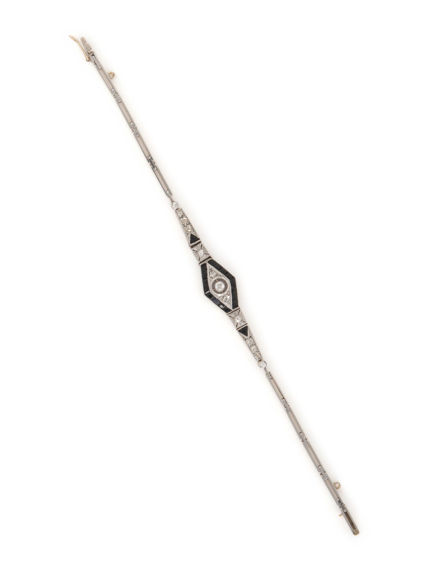 FRENCH, DIAMOND AND ONYX BRACELET