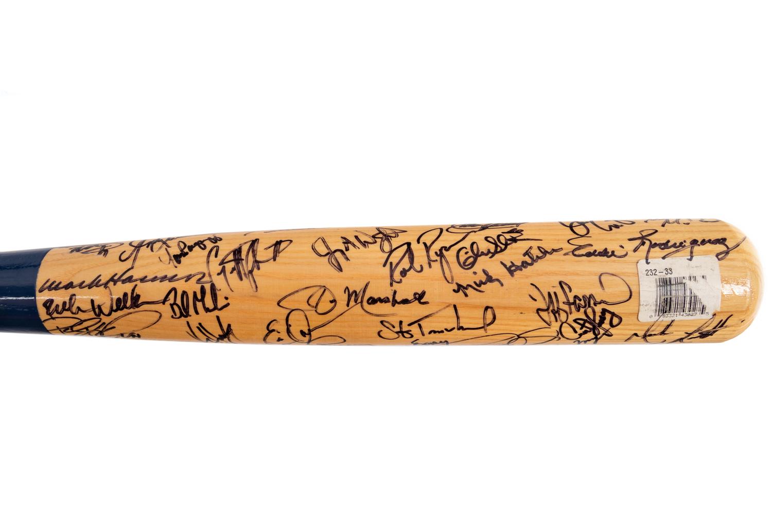 A Group of Baseball Bats Formerly Displayed at Mike Ditka's Restaurant (Including Ken Griffey Jr. and Hank Aaron Signed),