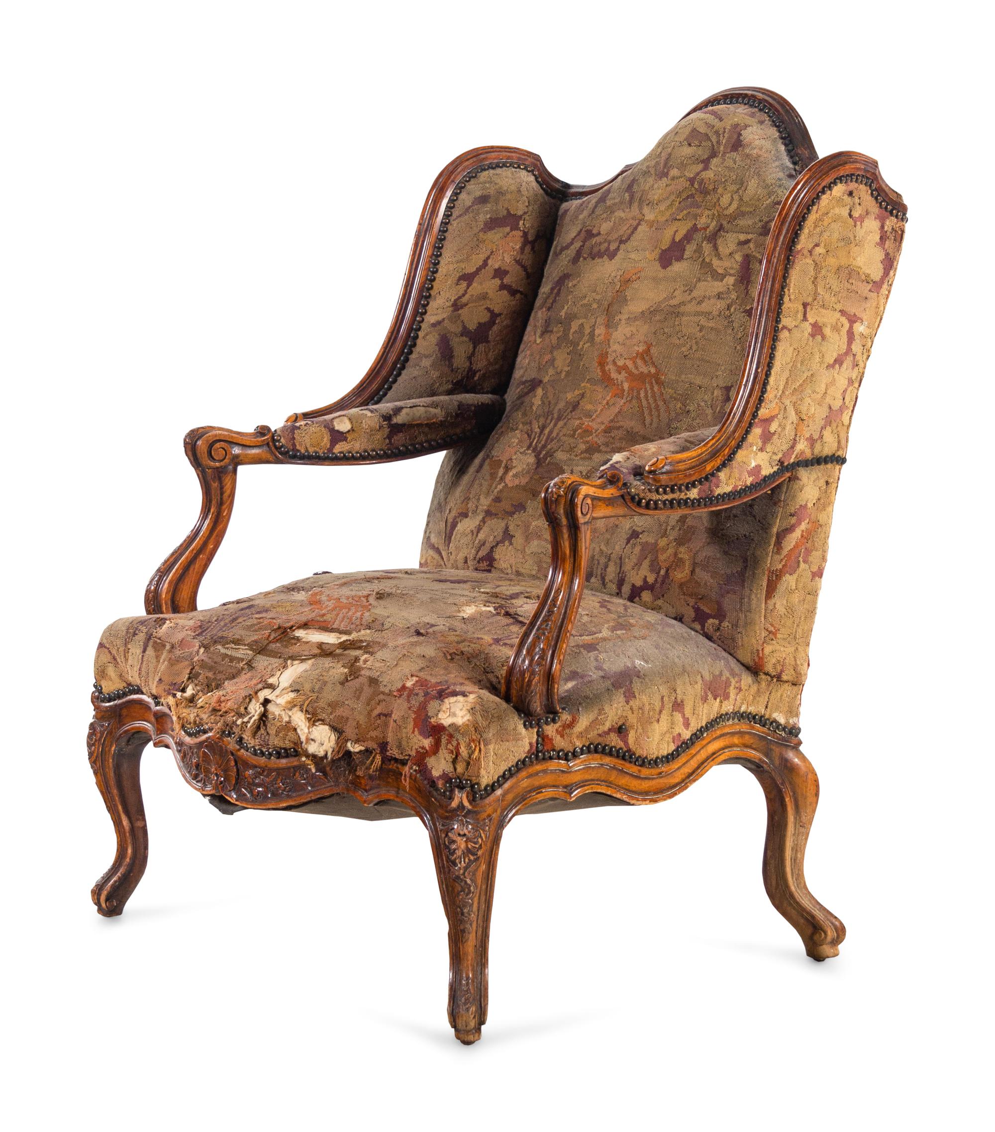 A Louis XV Style Walnut Tapestry-Upholstered Bergère