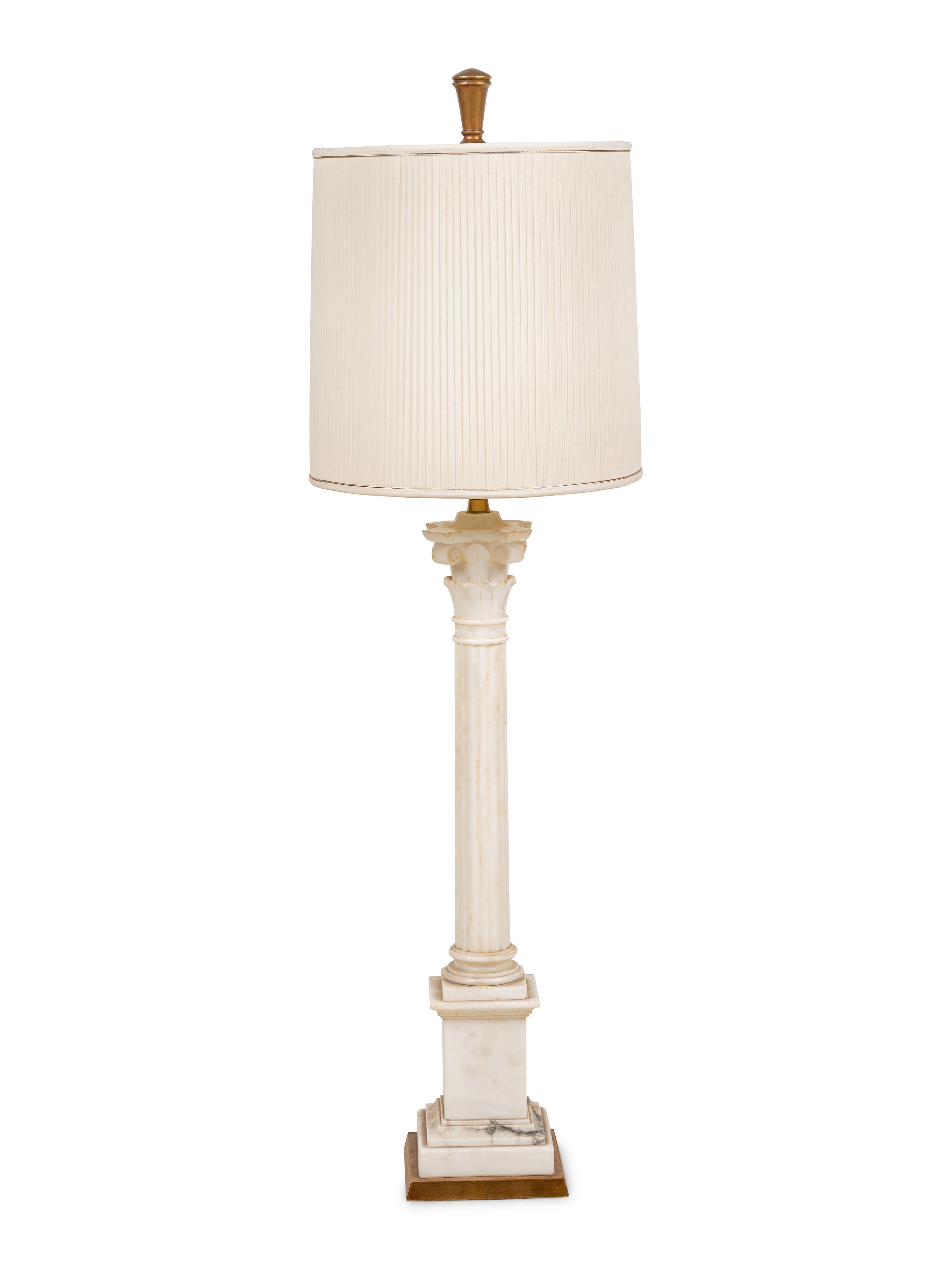A Carved Marble Columnar Lamp