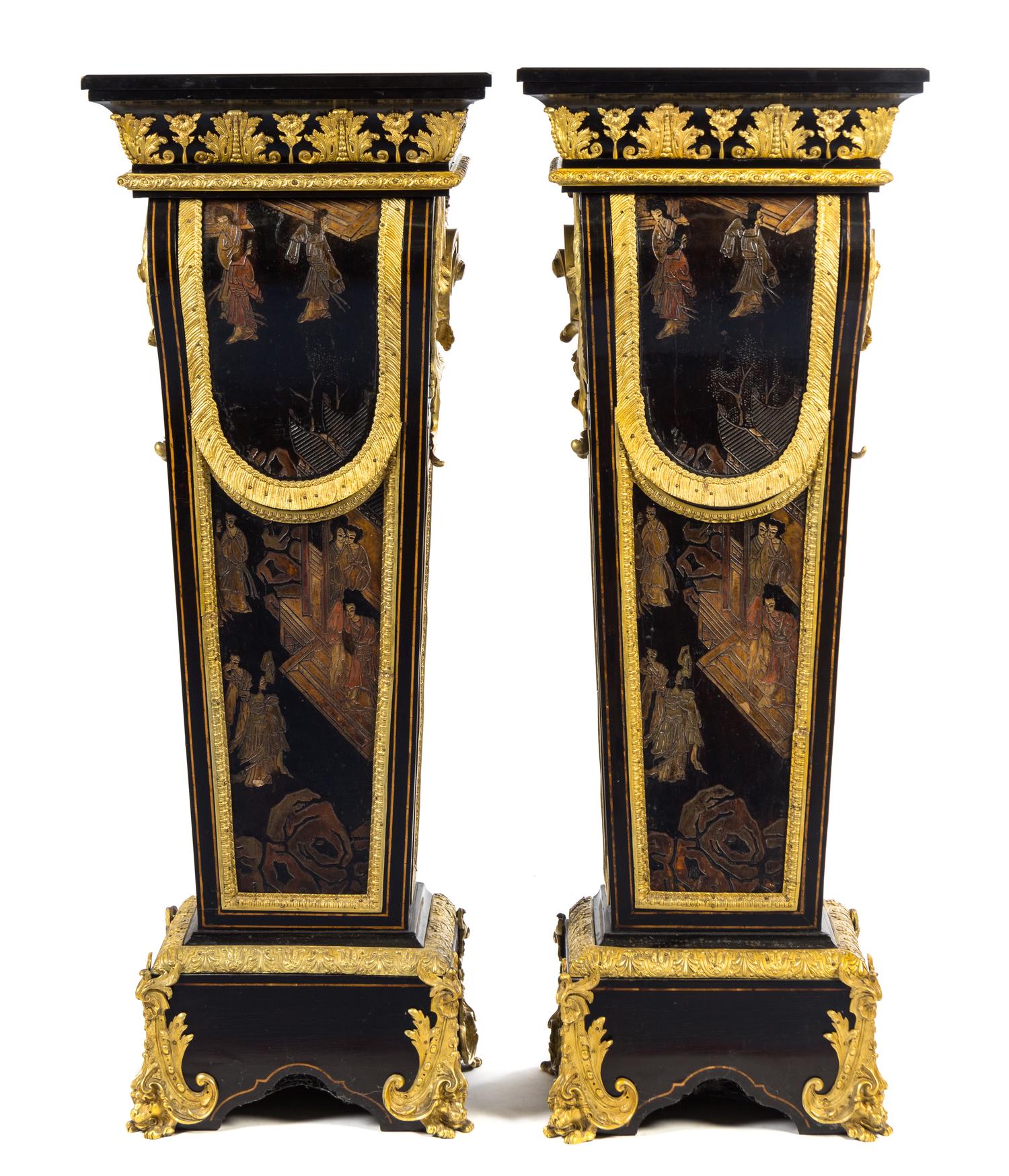 A Pair of Napoleon III Gilt Bronze Mounted and Coromandel Lacquer Inset Ebony Pedestals Height 55 1/2 x width 20 3/4 x depth 13 7/8 inc — 19TH CENTURY