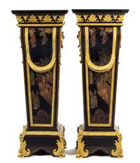 A Pair of Napoleon III Gilt Bronze Mounted and Coromandel Lacquer Inset Ebony Pedestals Height 55 1/2 x width 20 3/4 x depth 13 7/8 inc — 19TH CENTURY