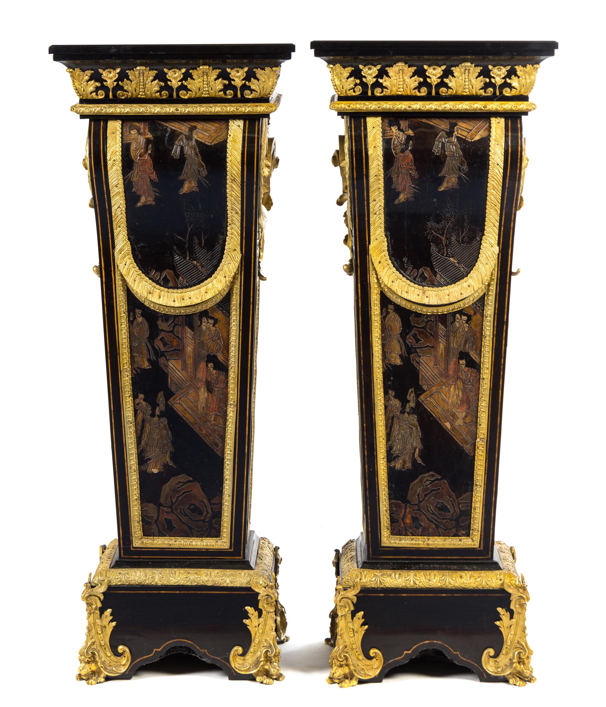 A Pair of Napoleon III Gilt Bronze Mounted and Coromandel Lacquer Inset Ebony Pedestals Height 55 1/2 x width 20 3/4 x depth 13 7/8 inc — 19TH CENTURY