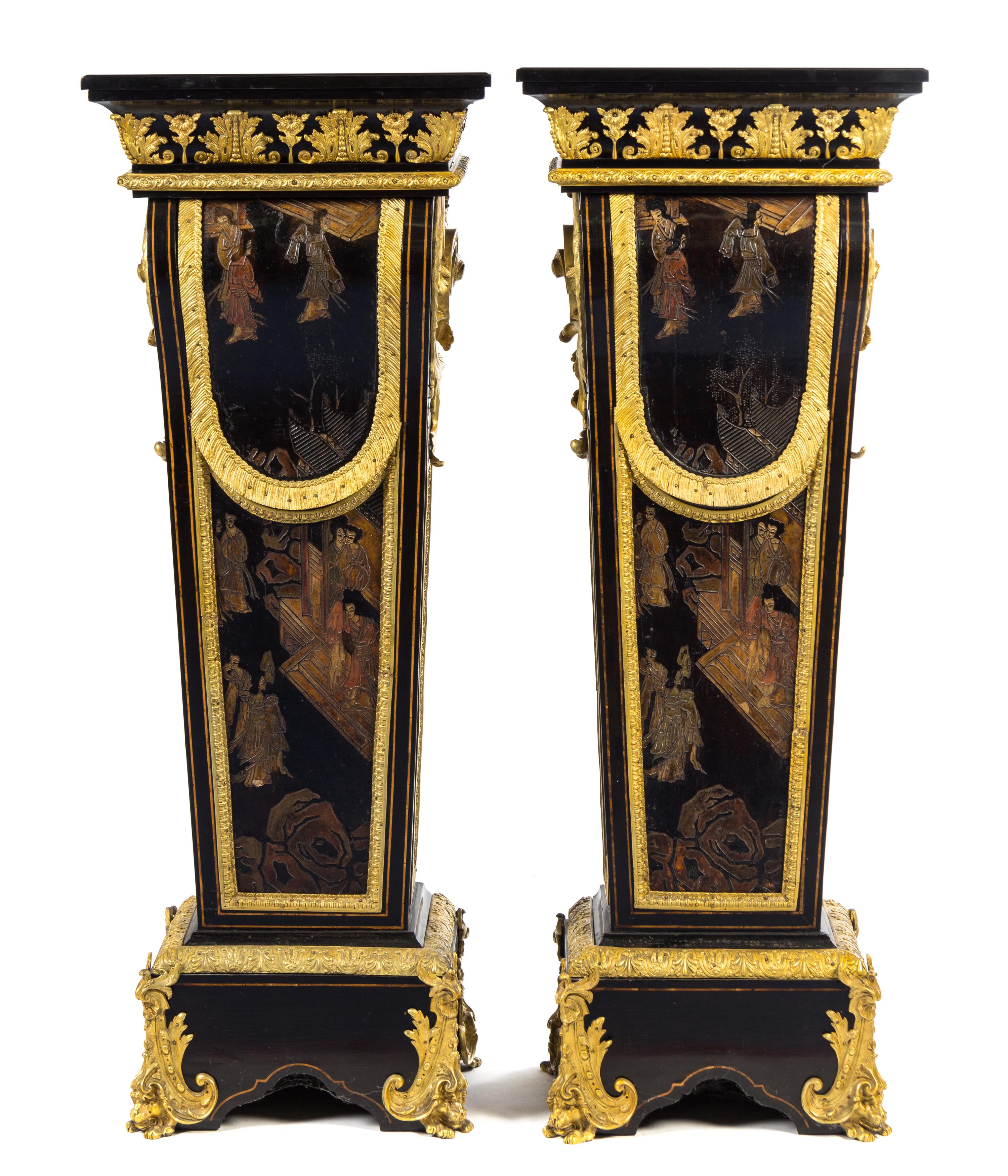 A Pair of Napoleon III Gilt Bronze Mounted and Coromandel Lacquer Inset Ebony Pedestals Height 55 1/2 x width 20 3/4 x depth 13 7/8 inc — 19TH CENTURY