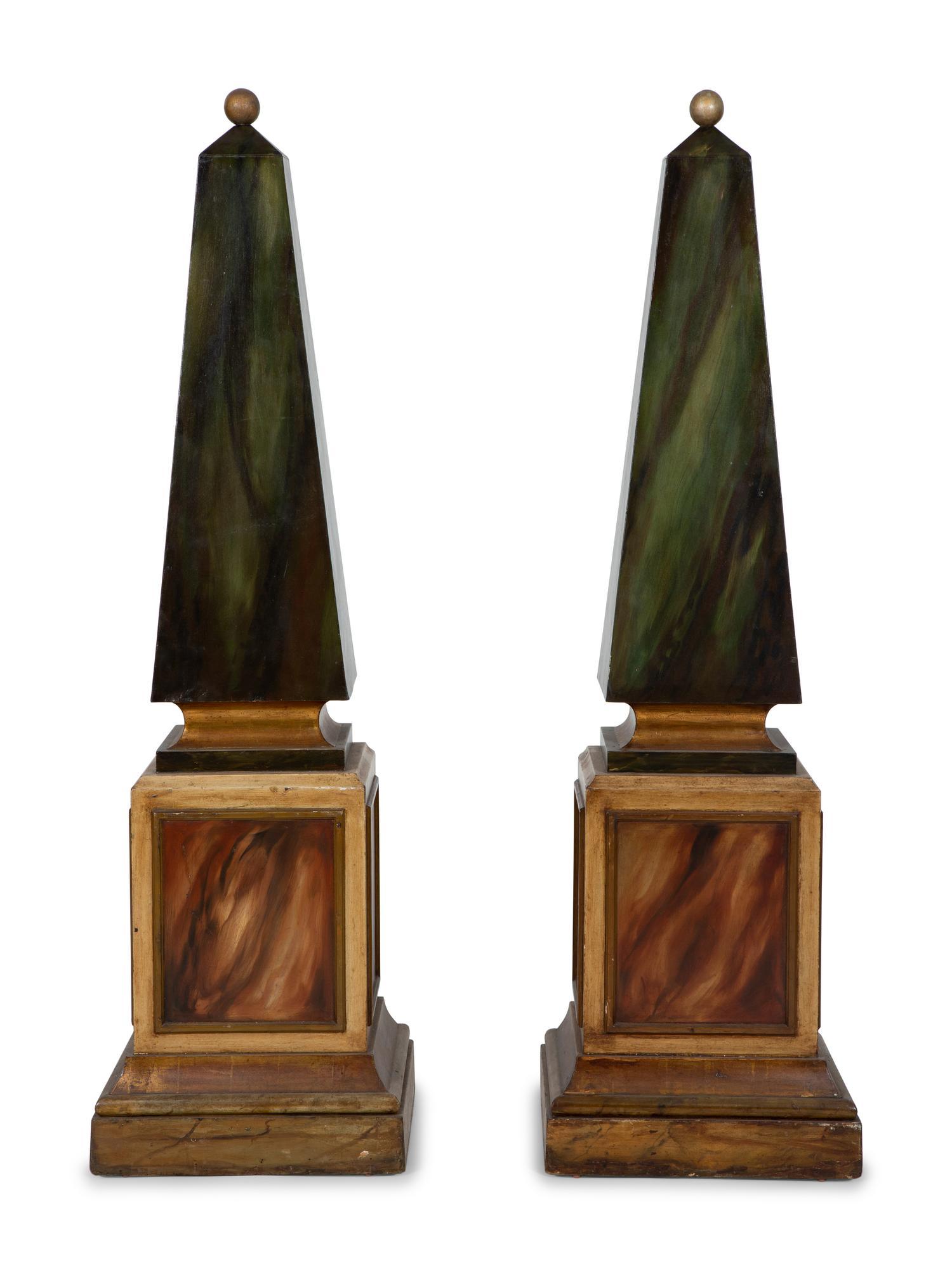A Pair of Painted and Parcel Gilt Faux-Marble Obelisks