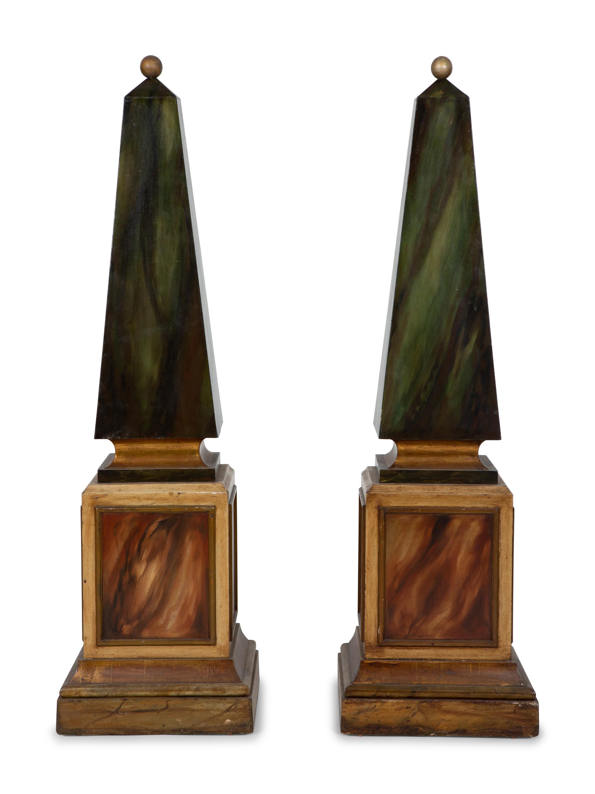 A Pair of Painted and Parcel Gilt Faux-Marble Obelisks