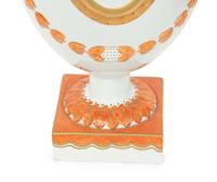 A Pair of Neoclassical Style Porcelain Urns with Bell Flower Swags