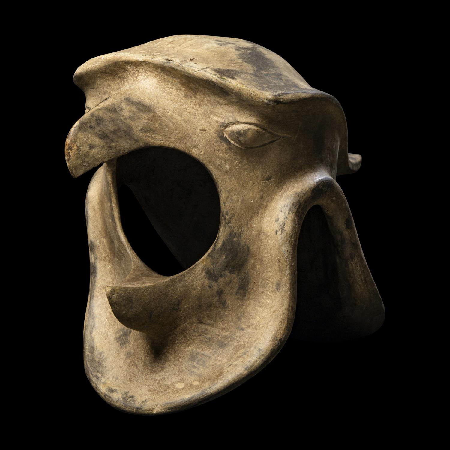 An Aztec Carved Wood Helmet of the Eagle Warrior