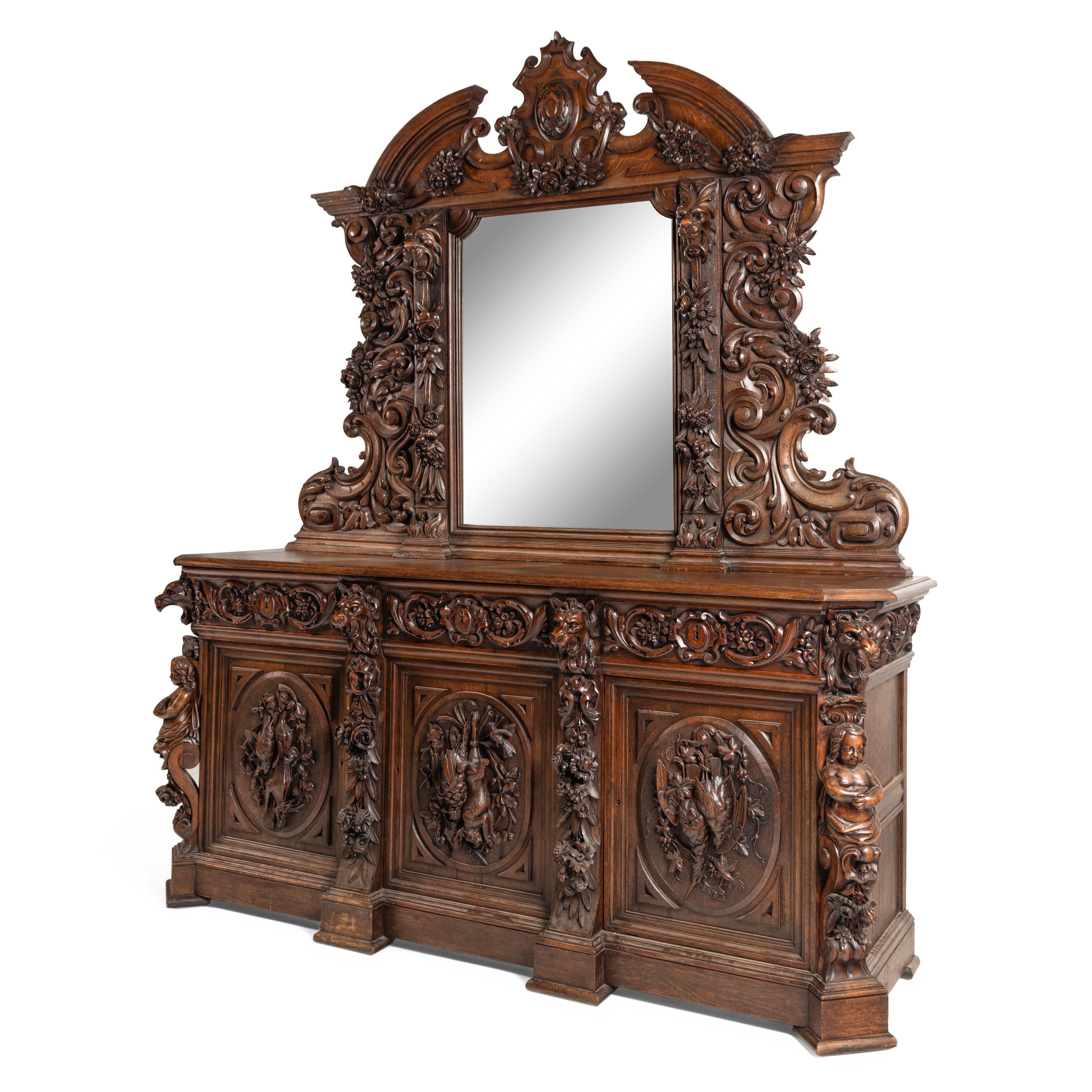 A French Carved Walnut Buffet à Deux Corps