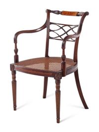 A Pair of George III Carved Mahogany Armchairs